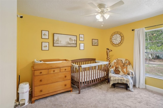 620 Fruitwood Ave, Winter Springs, FL 32708 - bedroom featuring carpet, a textured ceiling, ceiling fan, and baseboards