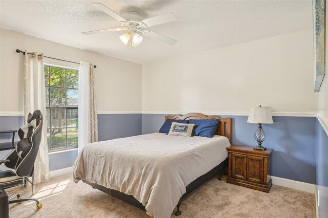620 Fruitwood Ave, Winter Springs, FL 32708 - bedroom featuring carpet floors, a textured ceiling, baseboards, and ceiling fan