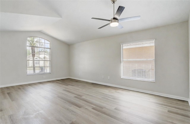 19540 Glen Elm Way, Orlando, FL 32833 - unfurnished room with wood finished floors, vaulted ceiling, baseboards, and ceiling fan