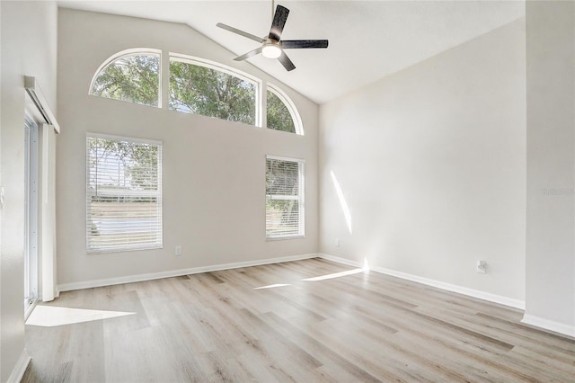 19540 Glen Elm Way, Orlando, FL 32833 - unfurnished room featuring high vaulted ceiling, wood finished floors, ceiling fan, and baseboards