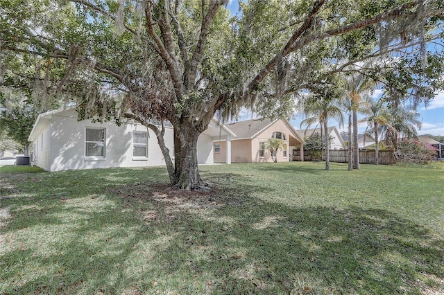 19540 Glen Elm Way, Orlando, FL 32833 - view of front of home with stucco siding and cooling unit