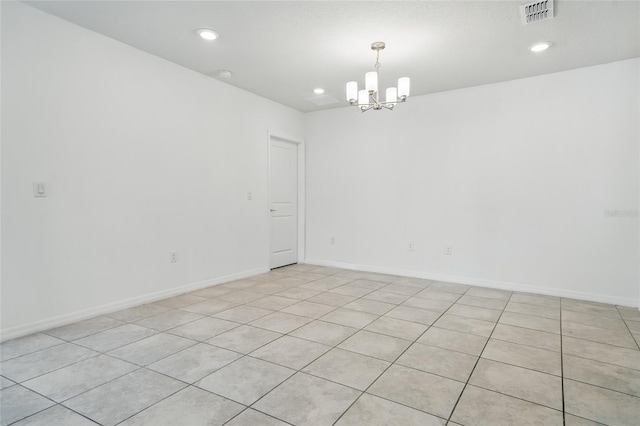unfurnished room featuring a chandelier, recessed lighting, baseboards, light tile patterned floors, and a smoke detector
