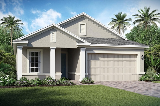 2112 Antilles Club Dr Unit 8, Kissimmee, FL 34747 - view of front facade featuring stucco siding, driveway, an attached garage, a front lawn, and a shingled roof