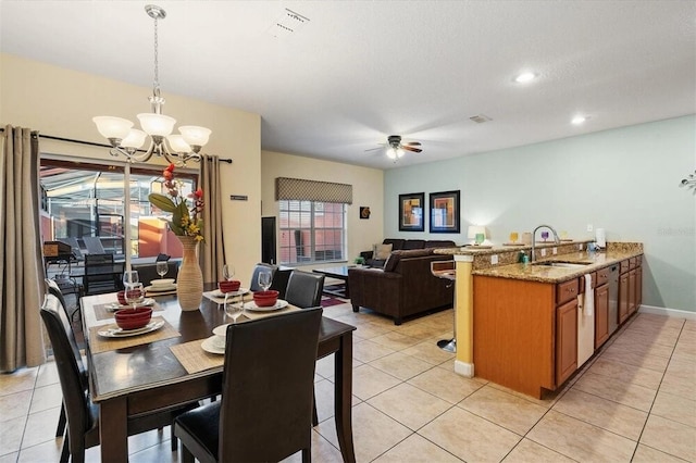 8941 Bismarck Palm Rd, Kissimmee, FL 34747 - dining space featuring a chandelier, ceiling fan, light tile patterned floors, and recessed lighting