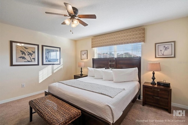 8941 Bismarck Palm Rd, Kissimmee, FL 34747 - bedroom with carpet floors, baseboards, and ceiling fan
