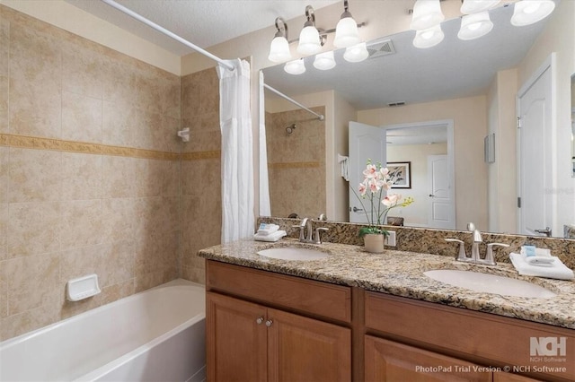 8941 Bismarck Palm Rd, Kissimmee, FL 34747 - full bath with shower / bath combo with shower curtain and double vanity