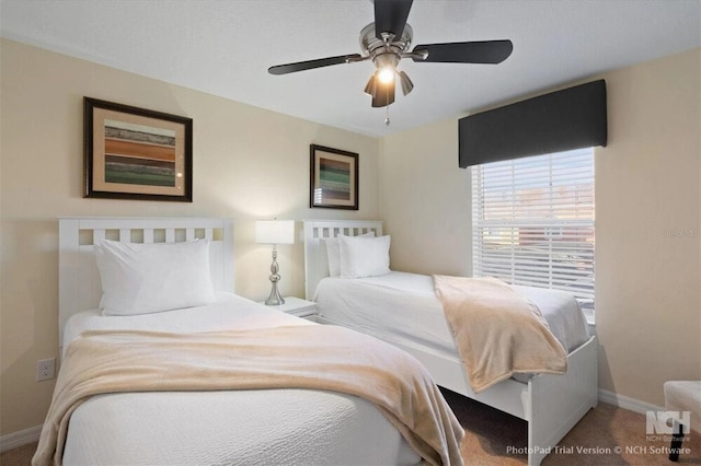 8941 Bismarck Palm Rd, Kissimmee, FL 34747 - carpeted bedroom with baseboards and a ceiling fan