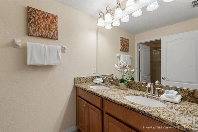 8941 Bismarck Palm Rd, Kissimmee, FL 34747 - bathroom featuring double vanity and a shower