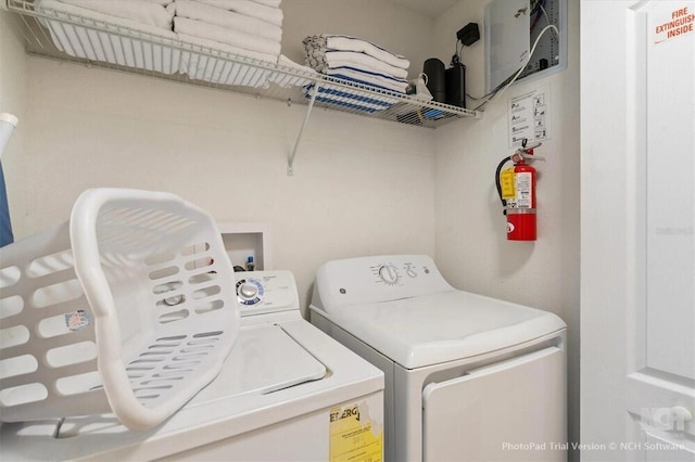 8941 Bismarck Palm Rd, Kissimmee, FL 34747 - laundry room with washing machine and clothes dryer