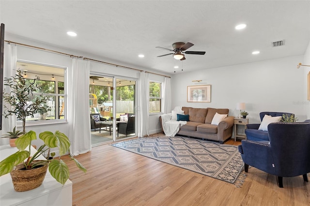 3520 Balsam Dr, Winter Park, FL 32792 - living room with light wood-style floors, ceiling fan, and recessed lighting
