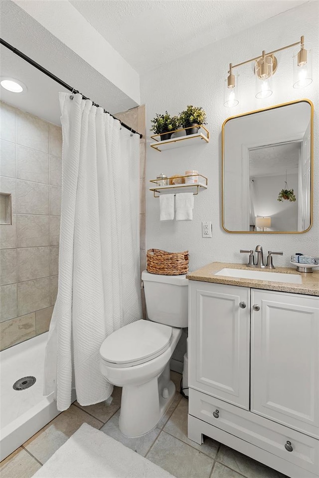 3520 Balsam Dr, Winter Park, FL 32792 - bathroom featuring tile patterned floors, toilet, vanity, and a shower stall