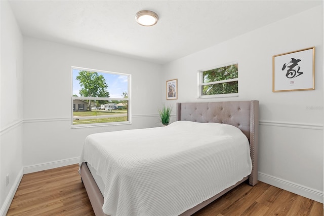 3520 Balsam Dr, Winter Park, FL 32792 - bedroom with baseboards and wood finished floors