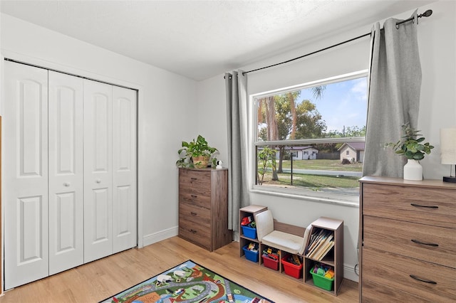 3520 Balsam Dr, Winter Park, FL 32792 - playroom with light wood finished floors and baseboards