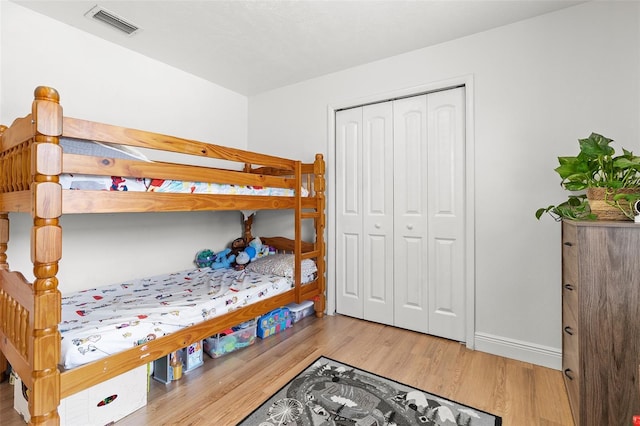 3520 Balsam Dr, Winter Park, FL 32792 - bedroom with wood finished floors, a closet, and baseboards