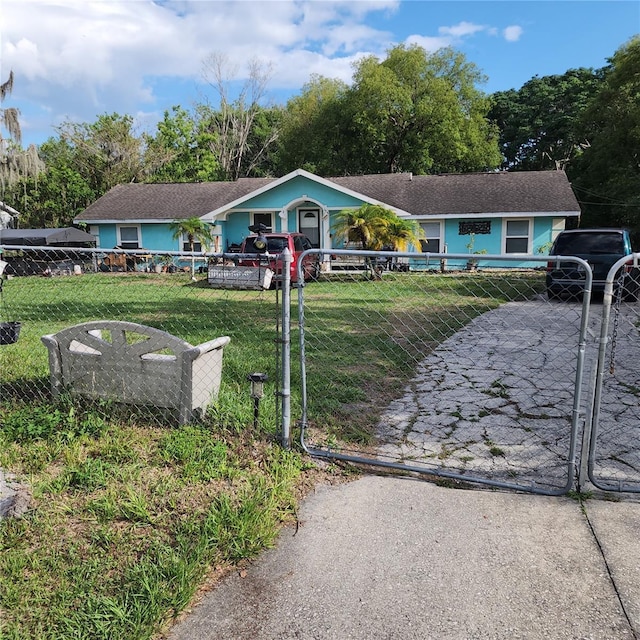 single story home with a gate