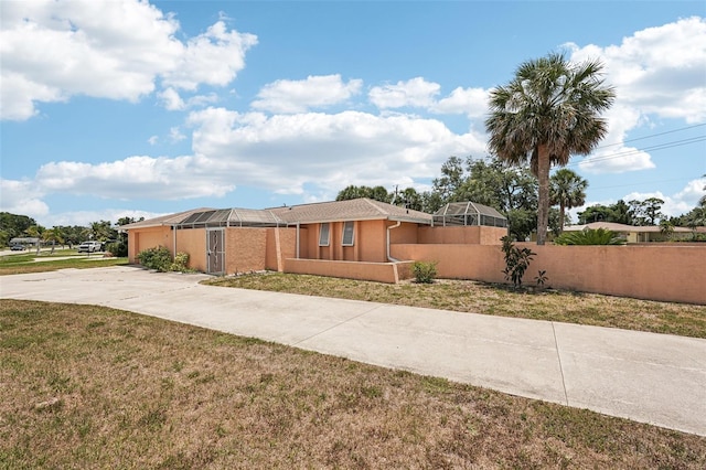 1301 Lucaya Ave, Venice, FL 34285 - view of front facade with driveway and an attached garage