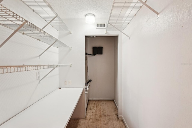 1301 Lucaya Ave, Venice, FL 34285 - spacious closet featuring light colored carpet