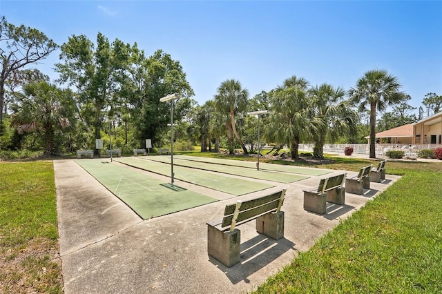 1301 Lucaya Ave, Venice, FL 34285 - view of property's community with a lawn and shuffleboard