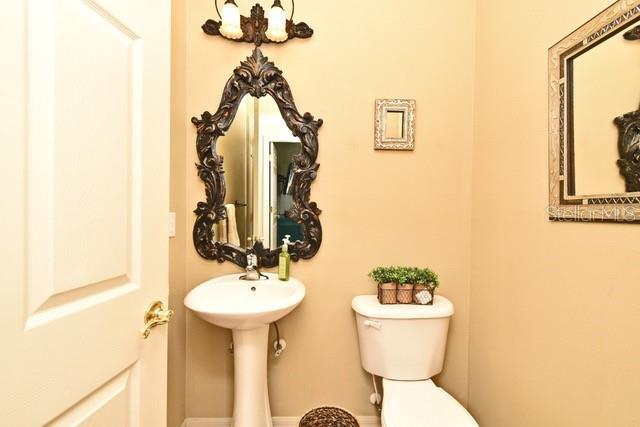 bathroom featuring toilet