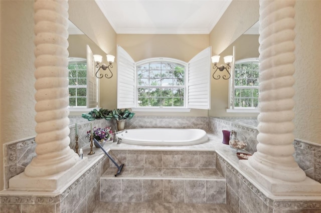 6686 SE 135th St, Summerfield, FL 34491 - bathroom featuring healthy amount of natural light, a garden tub, and ornamental molding