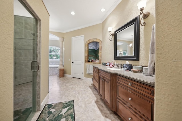 6686 SE 135th St, Summerfield, FL 34491 - bathroom featuring crown molding, a stall shower, a textured wall, vanity, and ornate columns
