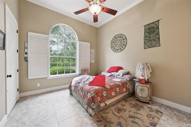 6686 SE 135th St, Summerfield, FL 34491 - bedroom with crown molding, baseboards, tile patterned floors, and ceiling fan