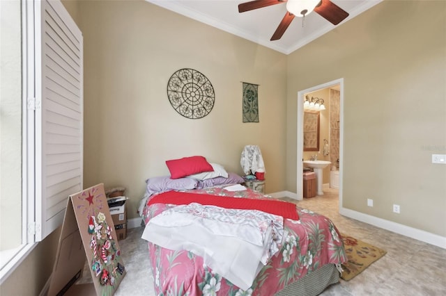 6686 SE 135th St, Summerfield, FL 34491 - bedroom with crown molding, connected bathroom, baseboards, and a ceiling fan