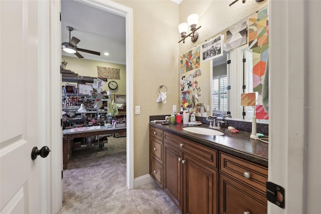 6686 SE 135th St, Summerfield, FL 34491 - bathroom with ceiling fan, vanity, tile patterned floors, and a textured wall