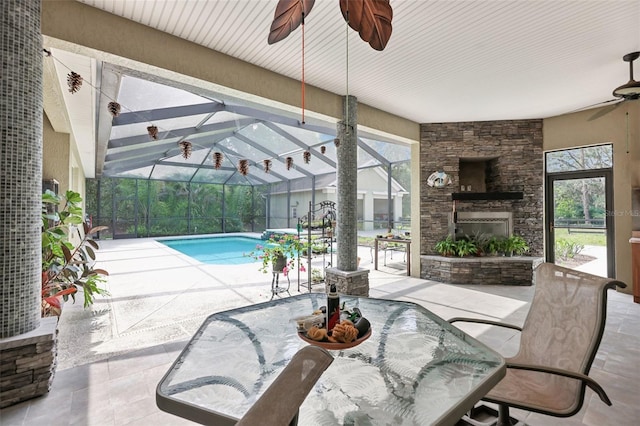 6686 SE 135th St, Summerfield, FL 34491 - swimming pool featuring ceiling fan, outdoor dining area, a patio, and a lanai
