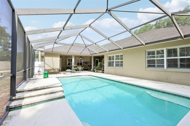 6686 SE 135th St, Summerfield, FL 34491 - outdoor pool featuring a patio, a ceiling fan, and a lanai
