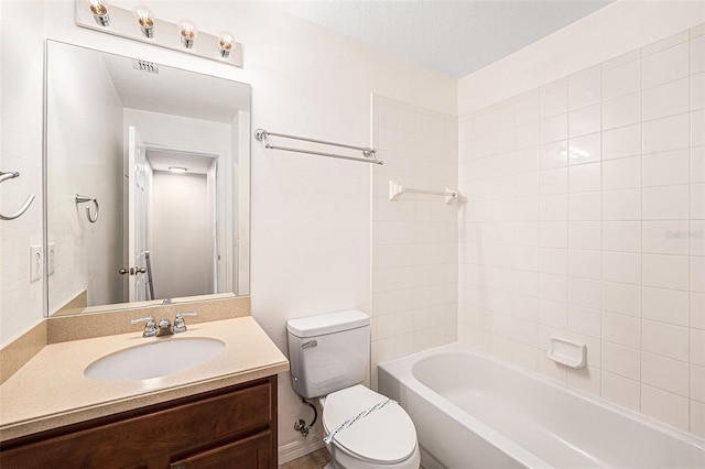 full bathroom featuring toilet, vanity, and shower / tub combination