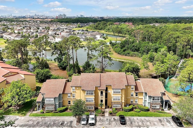 aerial perspective of suburban area with a large body of water