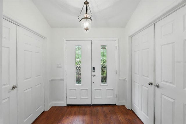 628 Riverpark Cir, Longwood, FL 32779 - entryway with dark wood-style flooring and baseboards