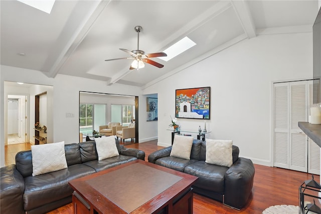 628 Riverpark Cir, Longwood, FL 32779 - living room with a skylight, a ceiling fan, wood finished floors, and baseboards