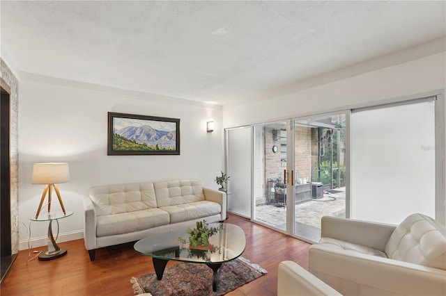628 Riverpark Cir, Longwood, FL 32779 - living room featuring wood finished floors and baseboards