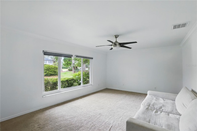 628 Riverpark Cir, Longwood, FL 32779 - unfurnished room with crown molding, carpet flooring, baseboards, and a ceiling fan