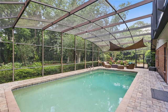 628 Riverpark Cir, Longwood, FL 32779 - swimming pool featuring an outdoor living space, a patio area, and a lanai