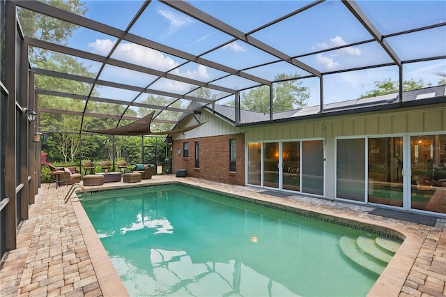628 Riverpark Cir, Longwood, FL 32779 - swimming pool with a patio area and a lanai