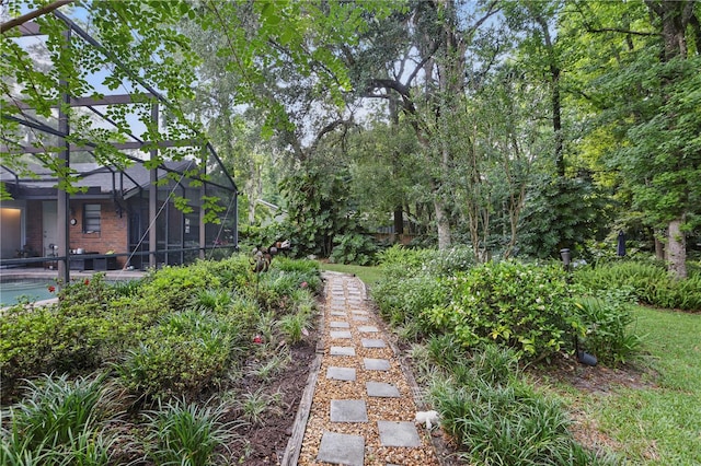 628 Riverpark Cir, Longwood, FL 32779 - view of yard featuring glass enclosure and an outdoor pool