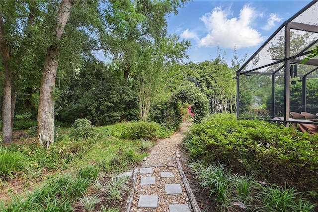 628 Riverpark Cir, Longwood, FL 32779 - view of yard featuring a lanai