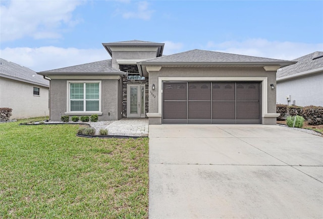 1602 W Caroline Path, Lecanto, FL 34461 - prairie-style house with driveway, an attached garage, stucco siding, and a front lawn