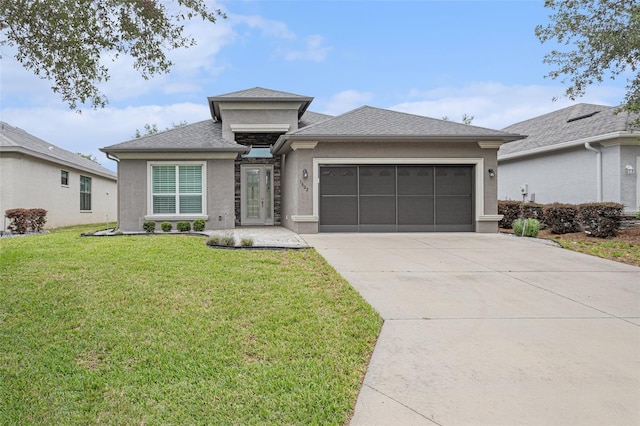 1602 W Caroline Path, Lecanto, FL 34461 - prairie-style home with an attached garage, driveway, stucco siding, a front yard, and roof with shingles