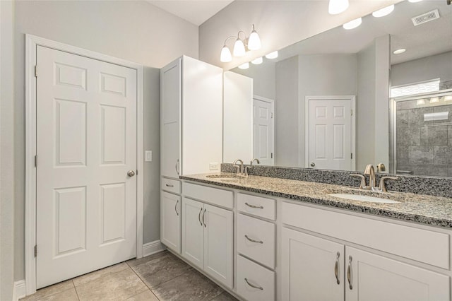 1602 W Caroline Path, Lecanto, FL 34461 - full bath with double vanity, baseboards, and a tile shower