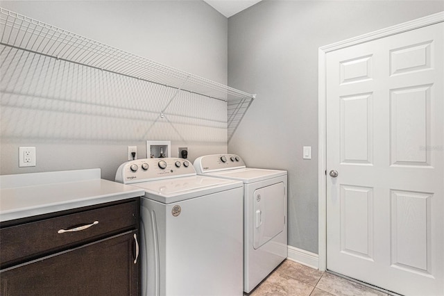 1602 W Caroline Path, Lecanto, FL 34461 - laundry room featuring light tile patterned floors, washer and dryer, and baseboards