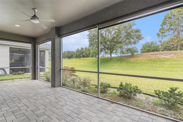 1602 W Caroline Path, Lecanto, FL 34461 - unfurnished sunroom featuring ceiling fan