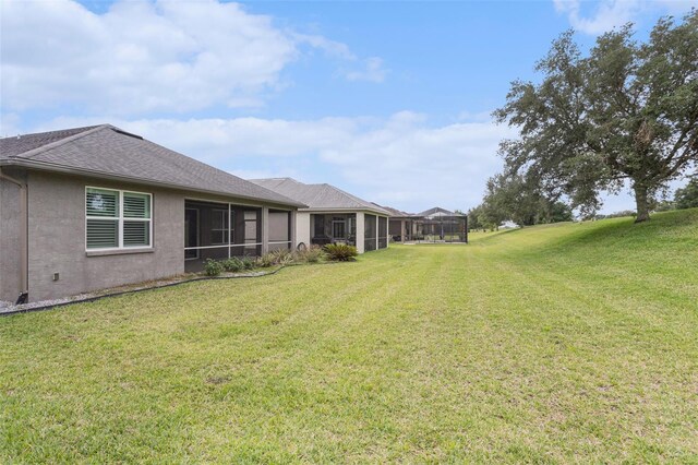 1602 W Caroline Path, Lecanto, FL 34461 - view of grassy yard featuring a sunroom