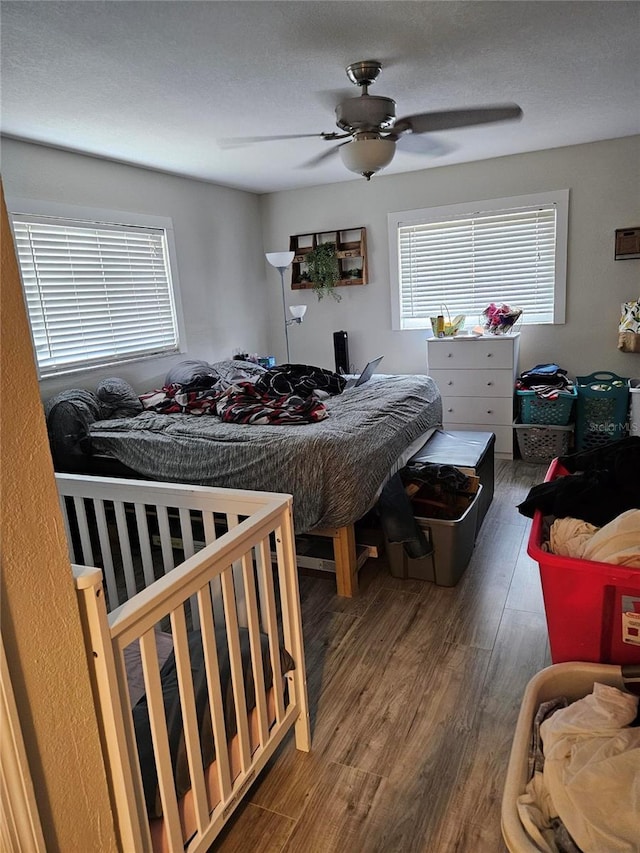 119 Caddy Rd, Rotonda West, FL 33947 - bedroom featuring wood finished floors and ceiling fan