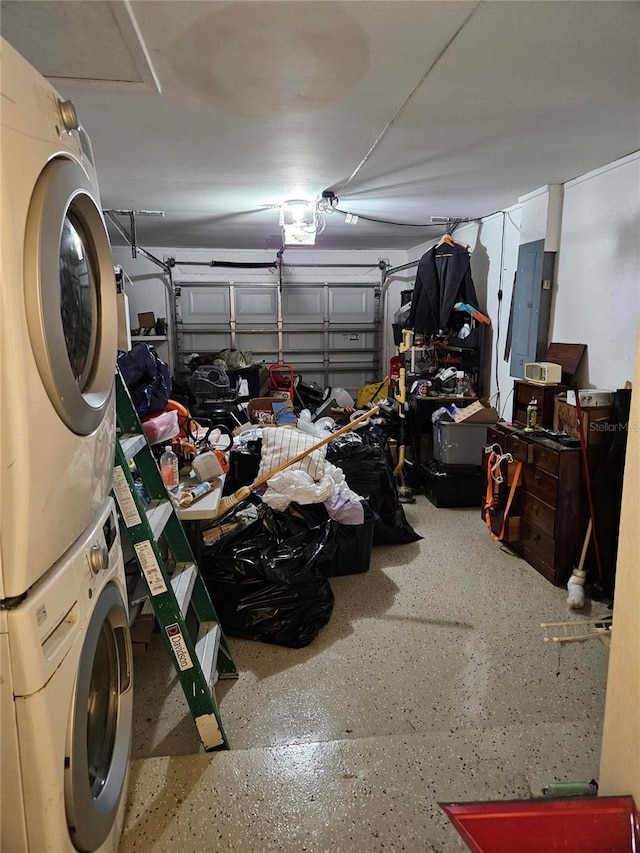 119 Caddy Rd, Rotonda West, FL 33947 - garage featuring stacked washing machine and dryer and electric panel