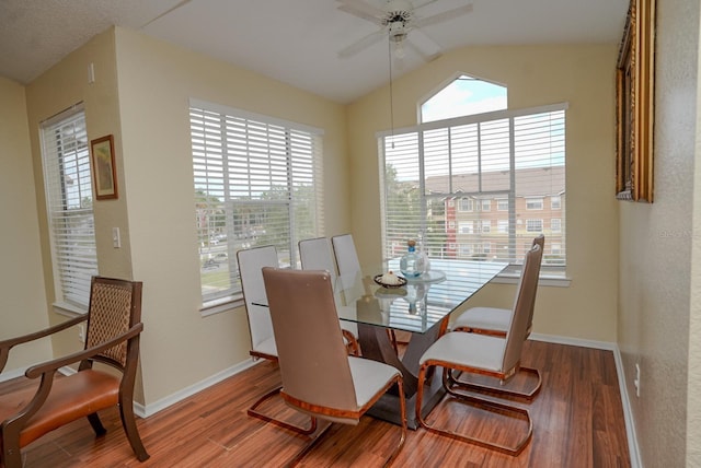 2208 Antigua Pl Unit 932, Kissimmee, FL 34741 - dining space featuring wood finished floors, lofted ceiling, a ceiling fan, and baseboards
