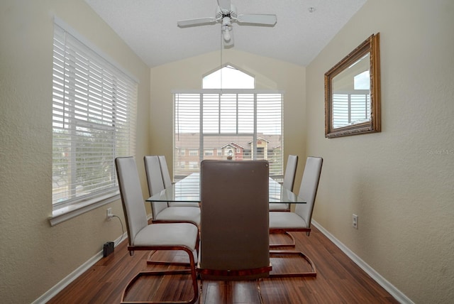 2208 Antigua Pl Unit 932, Kissimmee, FL 34741 - dining area with wood finished floors, vaulted ceiling, a textured wall, baseboards, and a ceiling fan